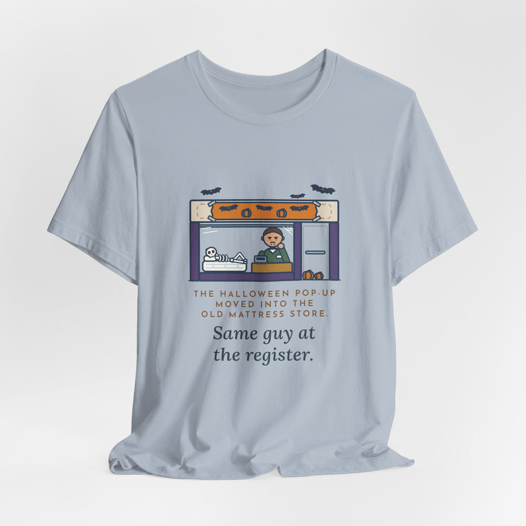 Funny Halloween T-Shirt - The Halloween Pop-Up Moved Into the Old Mattress Store, Same Guy at the Register