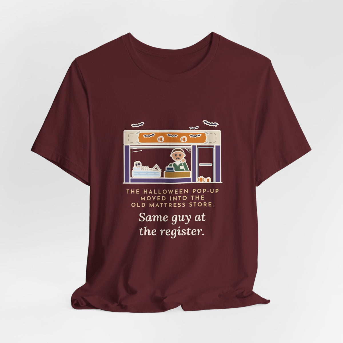 Funny Halloween T-Shirt - The Halloween Pop-Up Moved Into the Old Mattress Store, Same Guy at the Register
