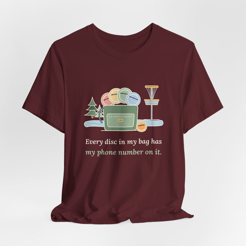 Disc Golf T-Shirt - Every Disc in My Bag Has My Phone Number on It. Funny Disc Golfer Tee