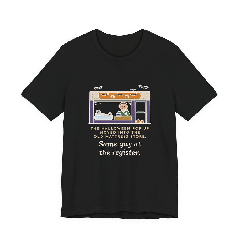 Funny Halloween T-Shirt - The Halloween Pop-Up Moved Into the Old Mattress Store, Same Guy at the Register
