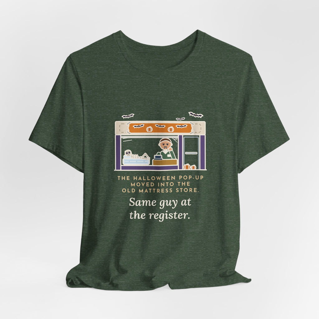 Funny Halloween T-Shirt - The Halloween Pop-Up Moved Into the Old Mattress Store, Same Guy at the Register