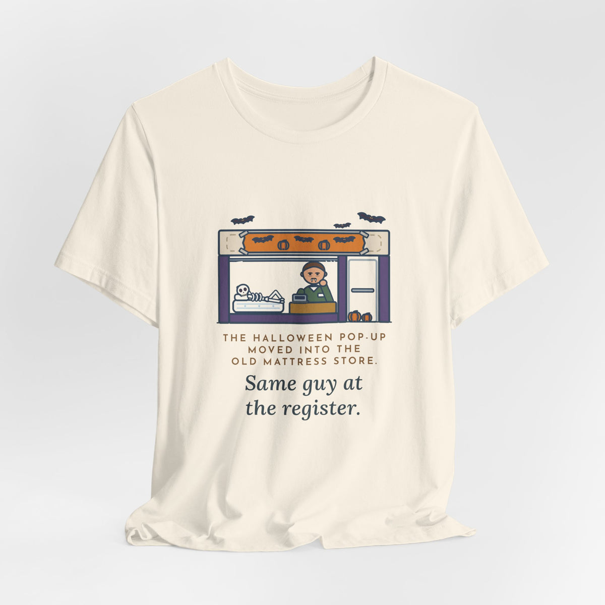 Funny Halloween T-Shirt - The Halloween Pop-Up Moved Into the Old Mattress Store, Same Guy at the Register